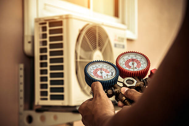 Professional Air Conditioning Service technician working in Idaho City, ID